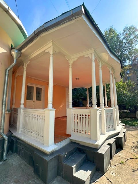 Open, summer veranda in the yard of the house.