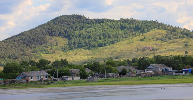 The picturesque landscape is largely due to the forests growing on rocky granite hills, separated by blue lakes.