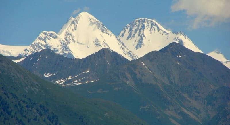 Mount Belukha, the highest peak in Siberia and the Altai Mountains, is located on the border of Kazakhstan and Russia. The mountain has two peaks: the Eastern (4,506 m above sea level) and the Western (4,440 m above sea level). In Kazakhstan, the mountain is known as Muztau, which translates as "Ice Mountain" because its peaks are permanently covered in snow and ice. Between the two peaks is the Belukha Saddle at an altitude of approximately 4,000 m. a. s. l. The Belukha massif contains 169 glaciers, including the Great and Small Berel Glaciers in Kazakhstan.