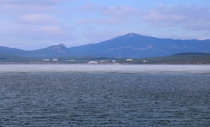 Mount Zheke batyr against the backdrop of Lake Shuchie.