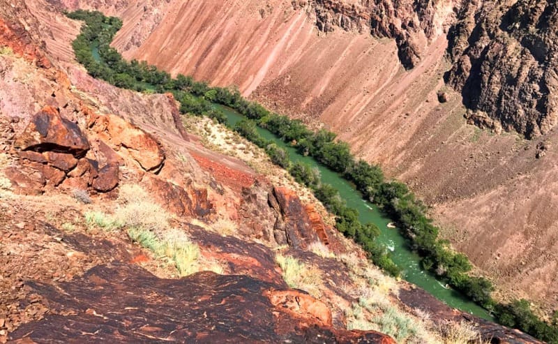 The 5-kilometer-long First Cascade of the Charyn Canyon begins at an altitude of 1,411.6 meters above sea level, 1.7 kilometers southwest of Mount Moinak, 1,878.5 meters above sea level.