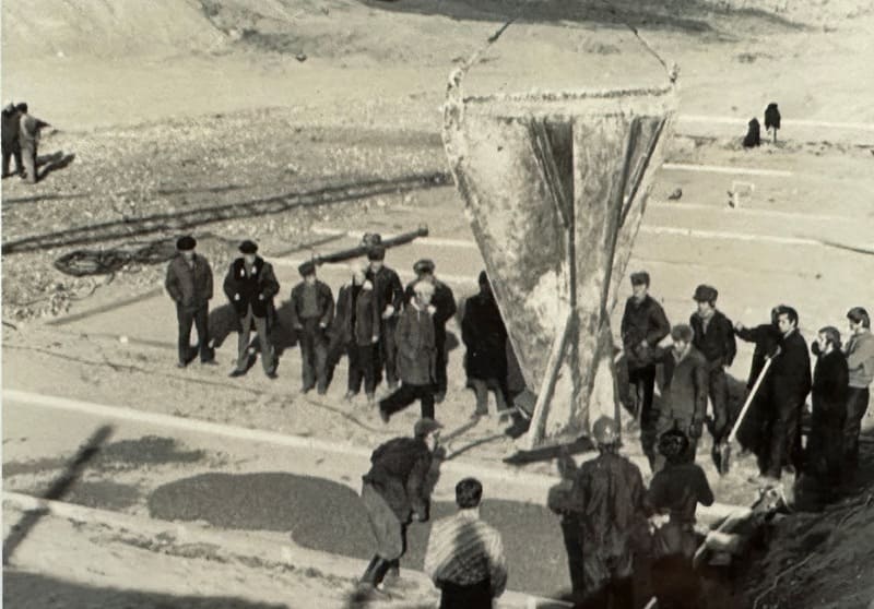 January 02, 1974. Pouring concrete into the foundation of the building.