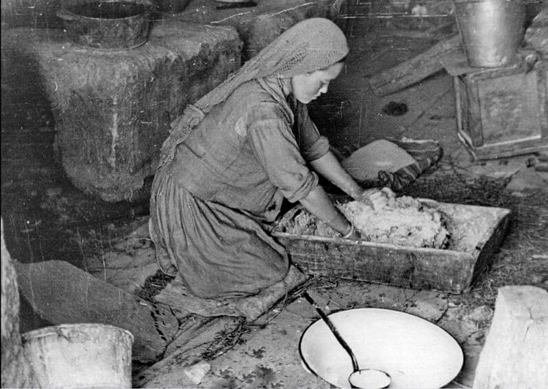 Kneading dough for tokochi. Photo by Ella Maillart. 1932.