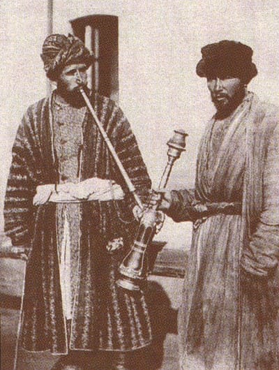 Smoking a chilim on the streets of Bukhara. Postcard, 1903.