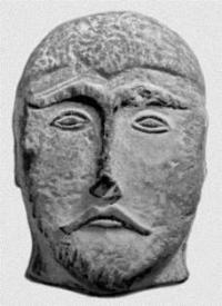 Голова тюрка. Гранит. VI - VIII в.в. Жамбылский краеведческий музей.