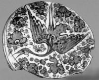 Dish bottom with a subglaze blue-white list from Nisa. XVth century.