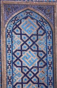 The mausoleum has a ribbed dome and fine portal decorated with a carved majolica.