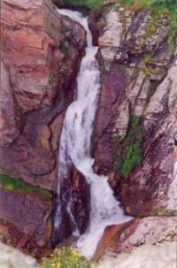 Waterfall on Zhabagly River in Kshi-Kaindy gorge.
