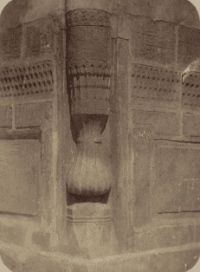 Tillya-Kari Madrasah. Inner courtyard (west side). Column base. Architectural detail of the Tillya-Kari Madrasah. Archaeological section of the "Turkestan Album." The detail includes carved white marble, which was often used in Samarkand structures after Tamerlane's campaign in India in 1399. In the photograph A corner column resting on a marble base with carved patterns and decorative panels is shown.