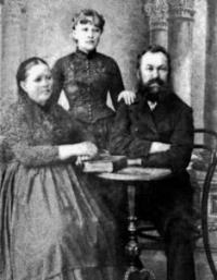 Nikita Yakovlevich and Evdokia Evtikhievna Pugasov with their daughter.