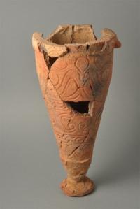 A 35 cm high vessel with narrow foot and wide collar.