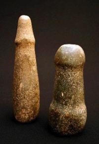 Pestles. A rock. Andronovo culture of the middle of the 2nd millennium BC.