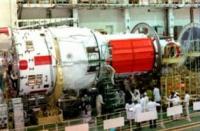 The base module of the Mir orbital station during preparation for the flight at the Baikonur Cosmodrome. 1986.