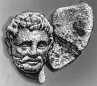 The male head from Nisa. Silver. II century BC. Museum of history of the Turkmen SSR. Ashgabat.