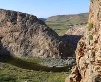 Aktogay Cave is located 1.6 kilometers west of the Aktogay village, in the western part of the Ulken-Aktau Mountains, 787 meters from the Zhanatas-Karatau road, in the Sarysu district of the Zhambyl region.