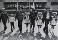Chief builders together with the first pupils of new school.