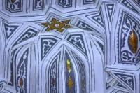 The mausoleum has a ribbed dome and fine portal decorated with a carved majolica.