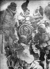 Installing coat of arms of Soviet Union at top of peak of Communism in 1972.