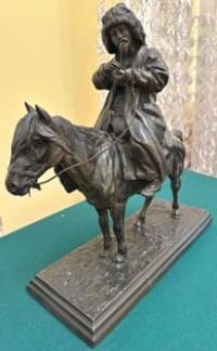 Horseman with a pipe.