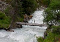 The Foot bridge through the river It is Ala-Archa.