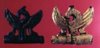 Suspension brackets with the image of an orlinogolovy griffin - details of horse equipment.