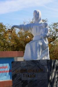 A monument of mother in square at local akimat in the city of Aralsk.