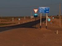 Road on share between settlements Dossor and Kulsary.