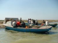 Fishermen before an output in the sea.