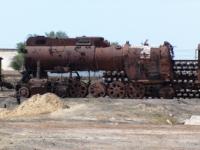 Cemetery of old steam locomotives at station Beineu.